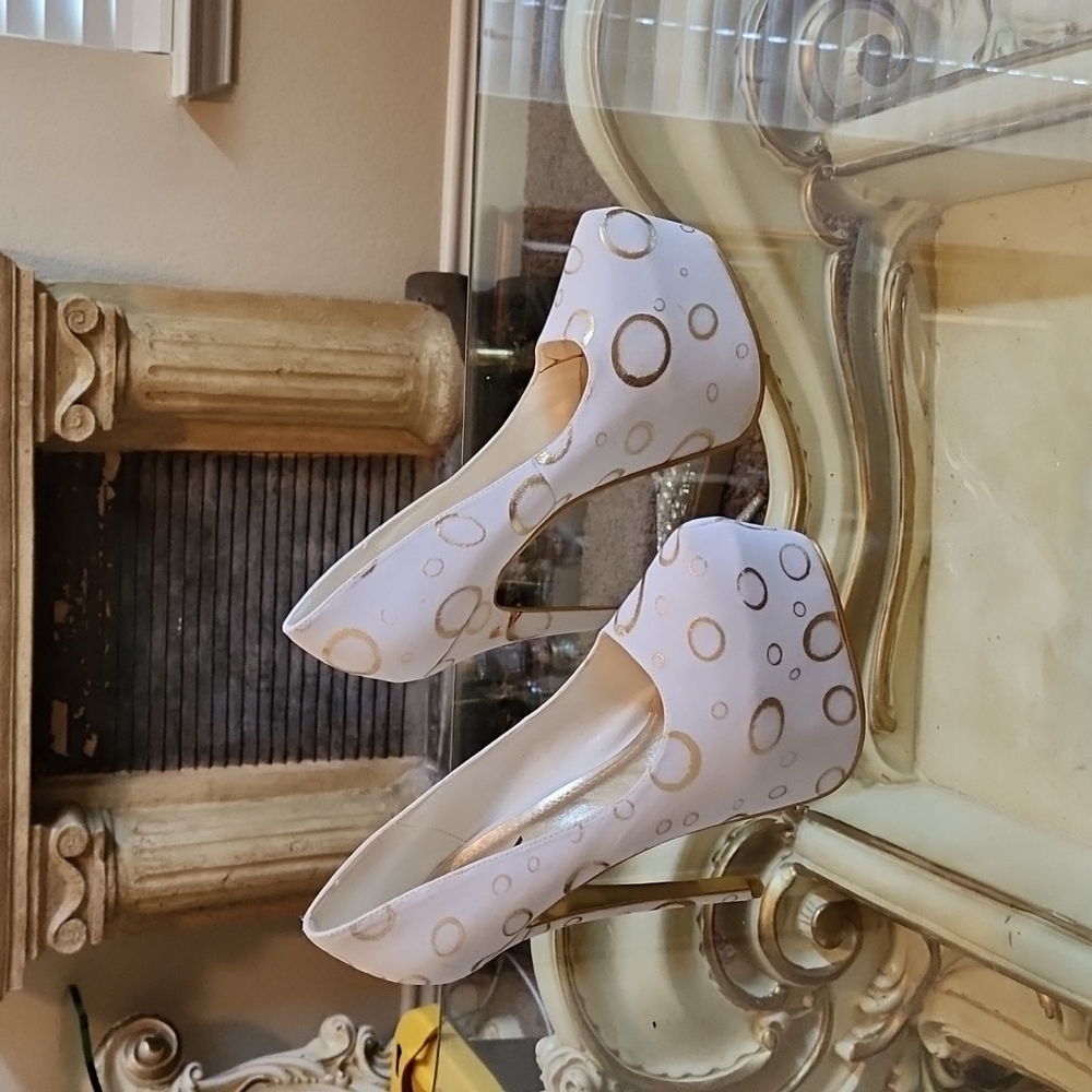 White and gold stiletos
